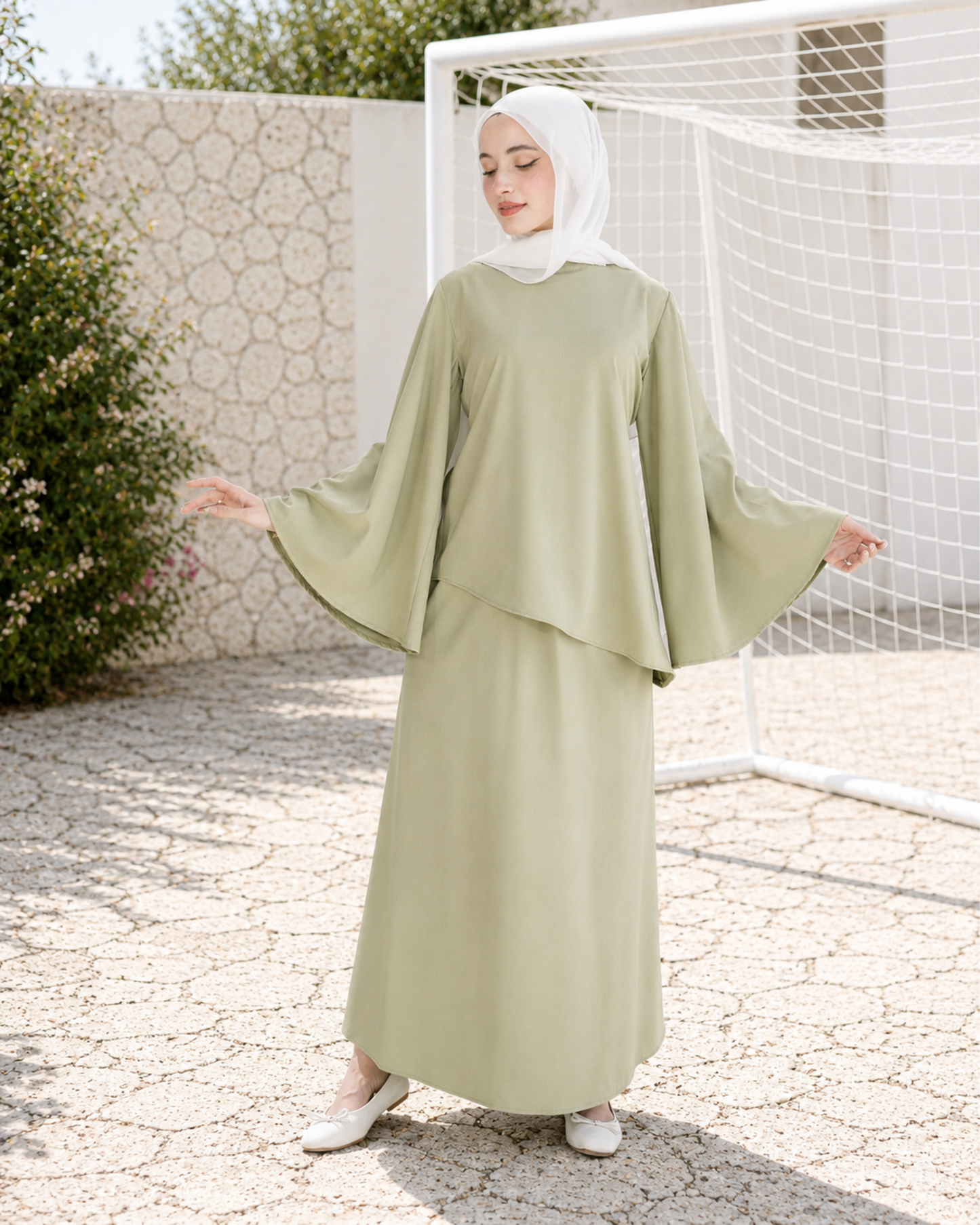 An elegant two-piece skirt set with a soft, flowing cut.